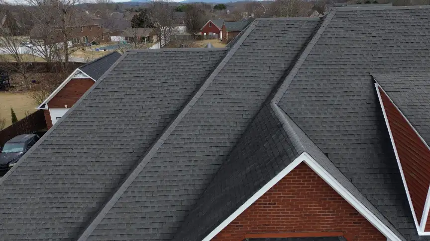Grey shingle roof on a red brick house in Hazel Green AL