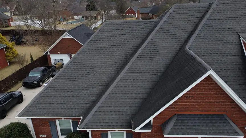 Multiple gables with new gray shingles by a Hazel Green roofing contractor