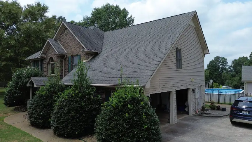 High-quality residential roof replacement protecting a two-story suburban home in North Alabama.