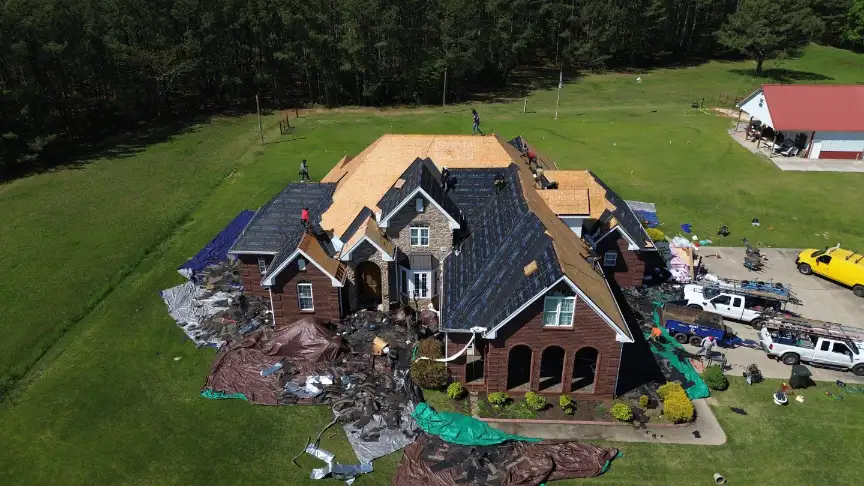 Large residential roof replacement in Hazel Green featuring new decking