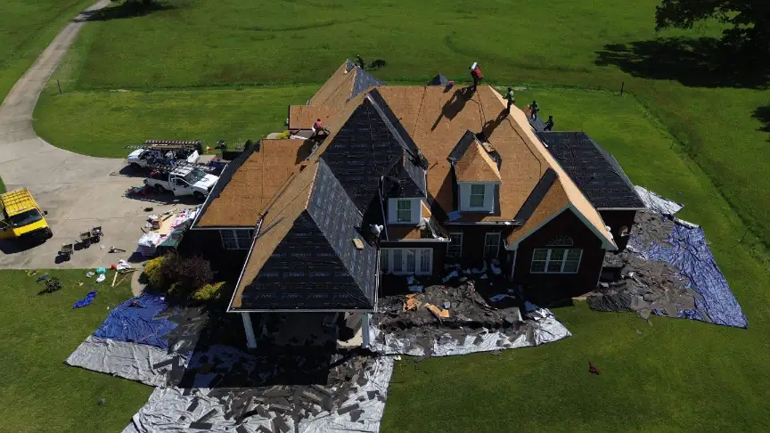Hazel Green roof replacement project showing ground protection and staging