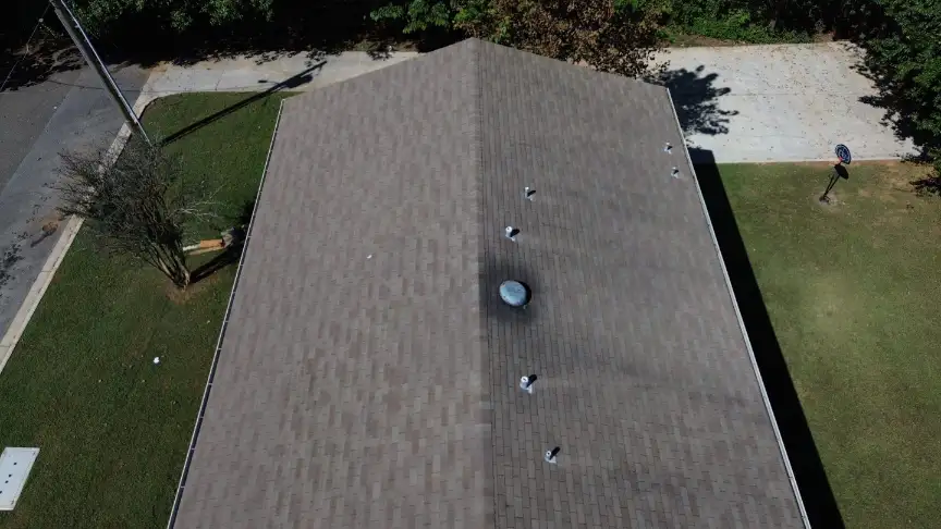 Brown shingled roof featuring new ventilation installed in Hazel Green