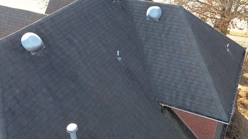 Completed gray shingle roof and chimney flashing in Hazel Green Alabama