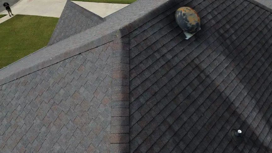 Dark shingle roof replacement showing ventilation in Hazel Green