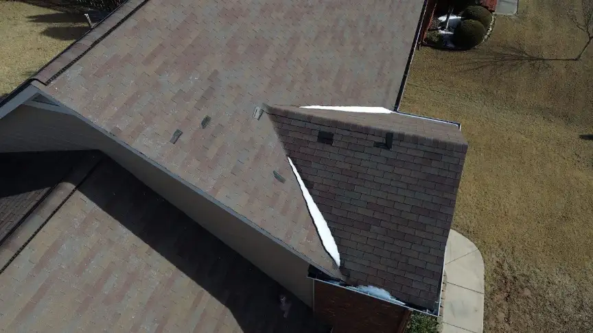 Finished brown shingle roof installed by Hazel Green roofing contractors