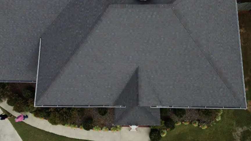 New dark gray gabled roof installed by roofing contractors in Hazel Green